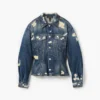 Den slitna och lagade flutade jeansjackan Den slitna och lagade flutade jeansjackan