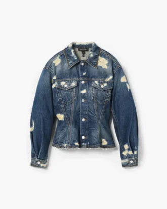 Den slitna och lagade flutade jeansjackan