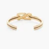Dual Cuff-armbandet Dual Cuff-armbandet