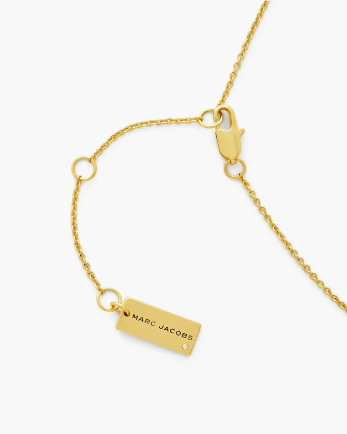 Halsband med knapp-hänge Halsband med knapp-hänge