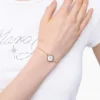 Knappkedjearmband