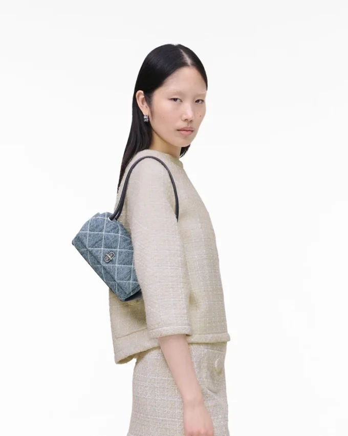 Quiltad mini-axelväska i denim