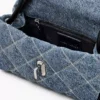 Quiltad mini-axelväska i denim