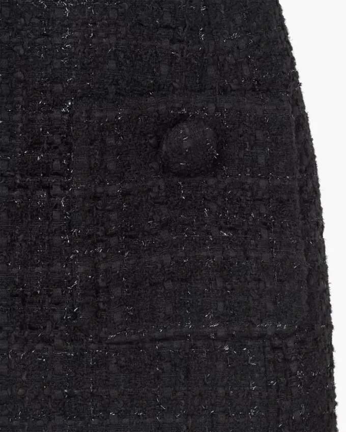 Skulptural tweedklänning Skulptural tweedklänning
