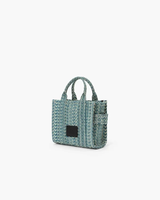 The tvättade Monogram-denim-crossbody Tote Bag The tvättade Monogram-denim-crossbody Tote Bag