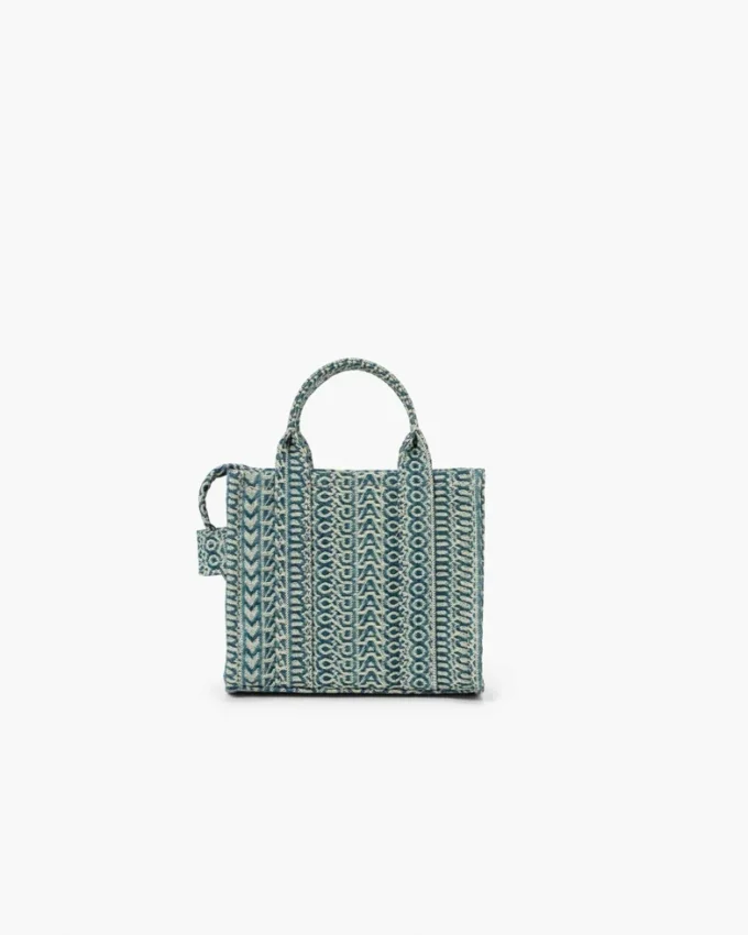 The tvättade Monogram-denim-crossbody Tote Bag The tvättade Monogram-denim-crossbody Tote Bag