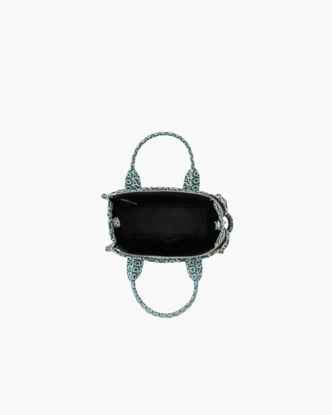 The tvättade Monogram-denim-crossbody Tote Bag The tvättade Monogram-denim-crossbody Tote Bag